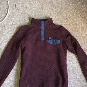 Maroon and navy button up Patagonia sweatshirt